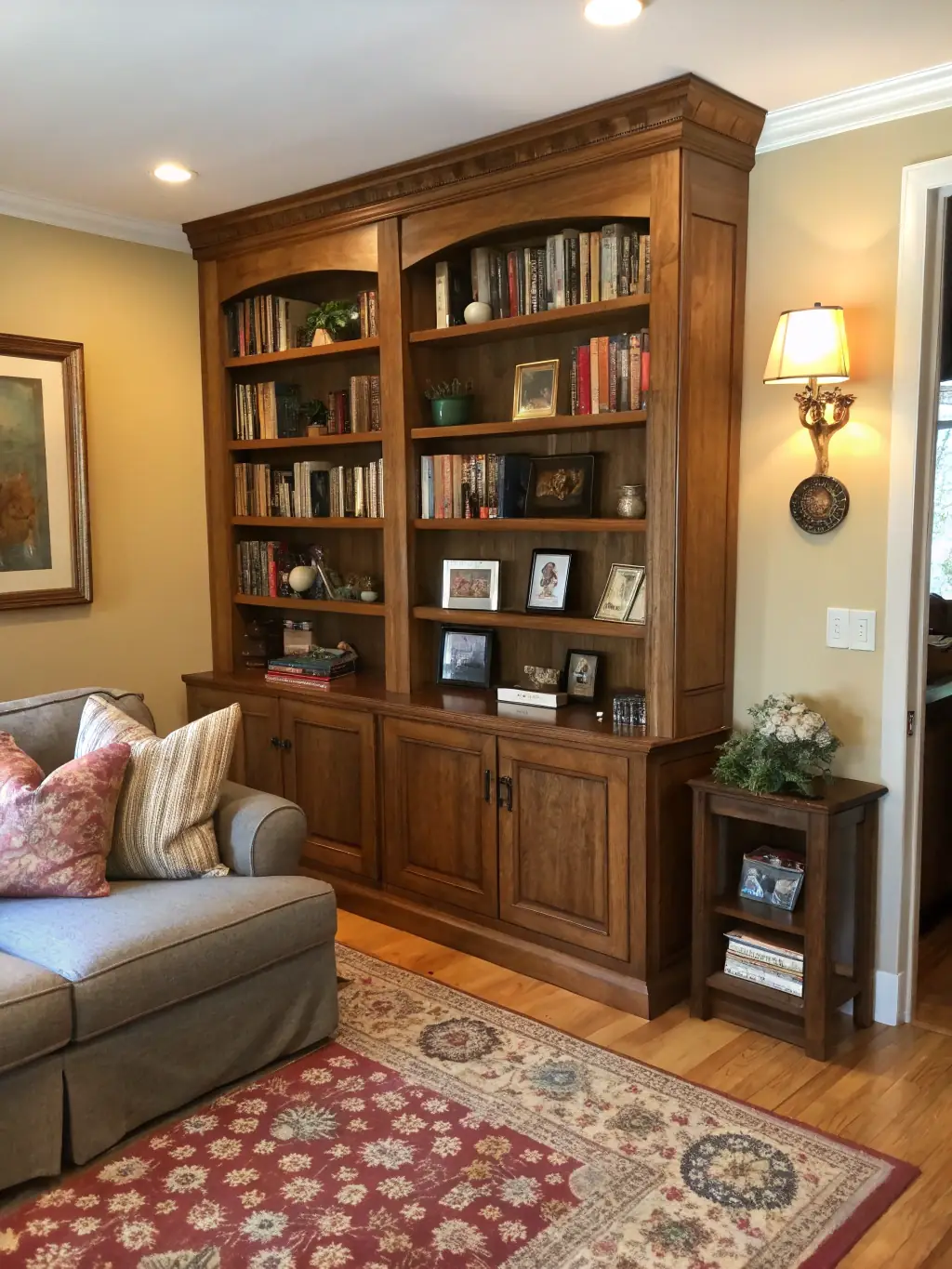 A cozy image showcasing a collection of handcrafted wooden furniture pieces, including a rustic coffee table, a charming bookshelf, and a stylish side chair, arranged in a warmly lit living room setting, highlighting SteelcaseCo's commitment to quality craftsmanship.